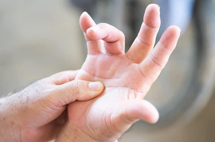 person with finger pain